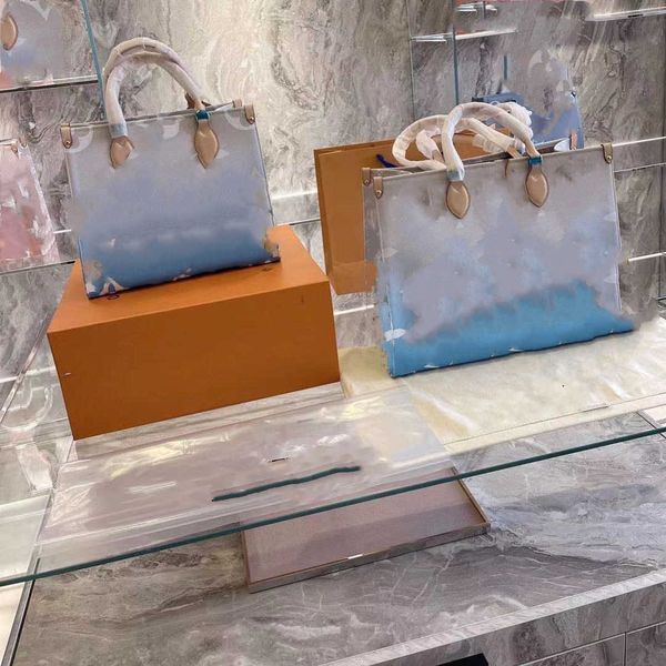 

1the 2021 big famous presents handbag gradient+ design bags classic designer fashion shopping bag pastel painting with leather