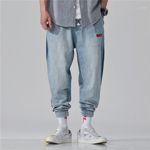 

fashion streetwear men jeans light blue side stripe designer loose fit denim cargo pants slack bottom hip hop jeans men joggers1
