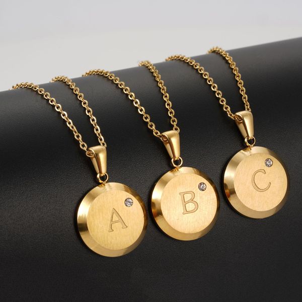 Acciaio inossidabile 26 Lettere iniziali Capitale A-Z Alfabeto Collana in oro Pendente A-Z Nome personalizzato Personalizzato Charms rotondo per lady Donne Ragazze con Pietra CZ