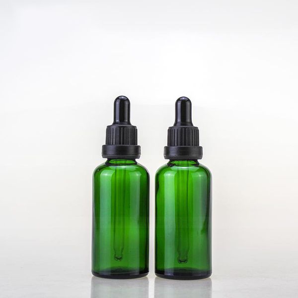 Preço de atacado 5ml 10ml 15ml 20ml 30ml 50ml 100ml Garrafas de óleo giratório de vidro verde com tampa preta à prova de crianças para cosméticos