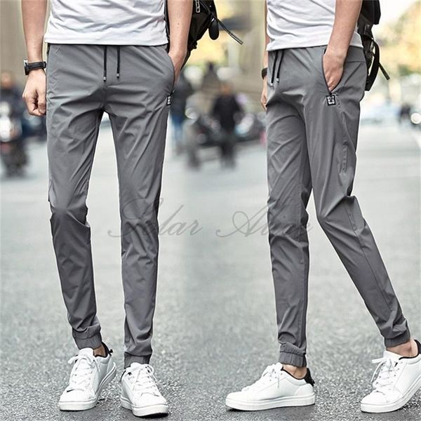 

2020 men's new elastic waist slim feet casual pants young students camouflage quick-drying pencil pants1, Black