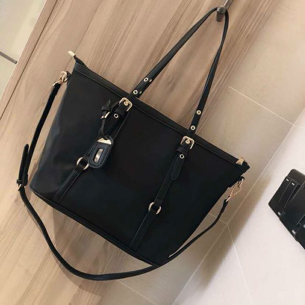 

женщины плеча сумки tote дизайнер crossbody сумка мода трапеция большая емкость черный регулируемый съемные ремни pd20101902