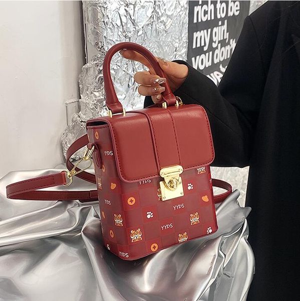

wholesaleladies leathers shoulder bags this years popular cartoon printed handbag street trend gold buckle small square bag vertical shaped