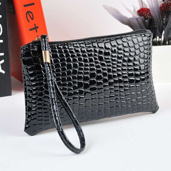 

luxurys designers autumn and winter new candy color crocodile pattern handle multi function change key bag