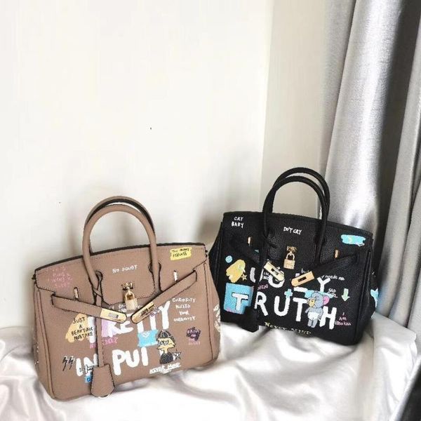 

japanese graffiti design cartoon cute hand-painted printing handbag female large-capacity bucket bag personality girls totes