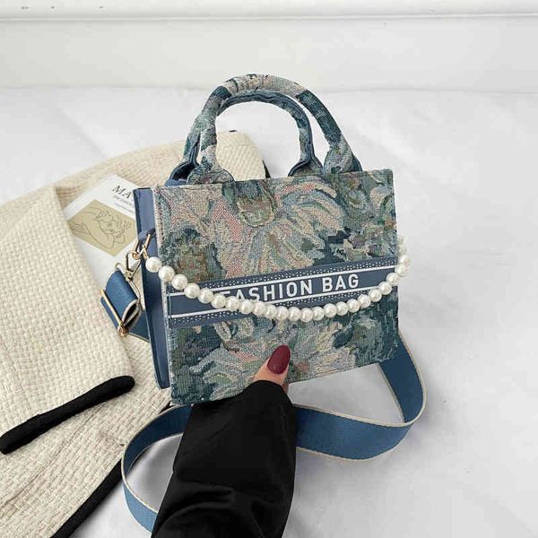 

2022 factory wholesale lattice beaded handbag women's trend winter printing fashion method simple foreign style messenger bag