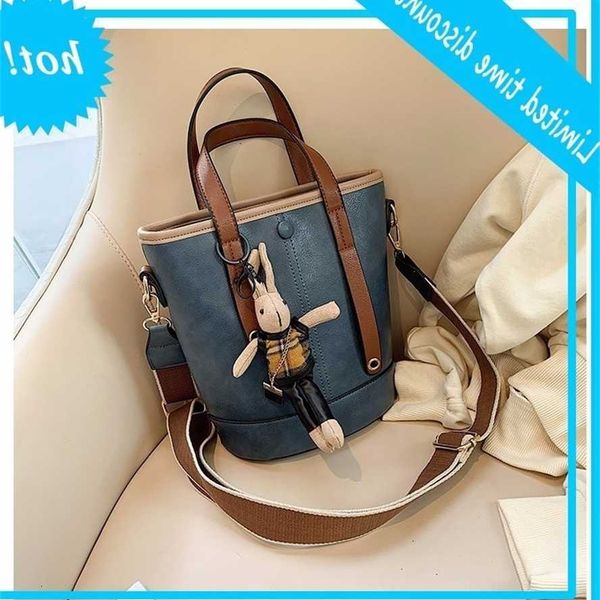 

2019 new korean high capacity women's silk scarf color contrast bucket single shoulder cross carry bag fashion