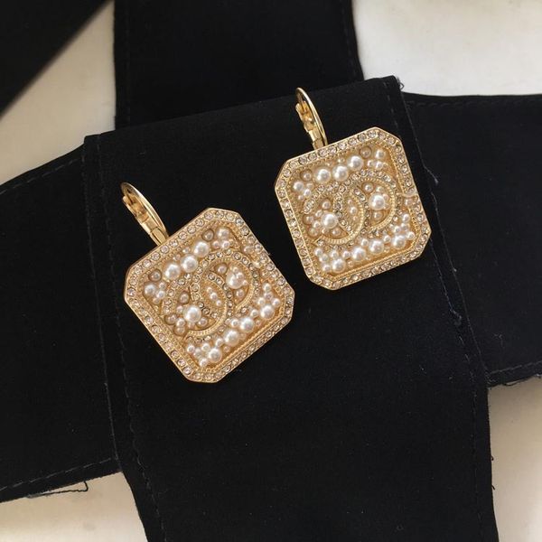 

xiangjia xiaoxiang fengshui zirconium pearl geometric square clasps double-c temperament, fashionable and versatile earrings, Golden