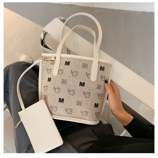 

ins женщины 2020 летом новой маленький слоненок печать tote симпатичного холста руки handbagshoulder сумка сумка сумка xi8qv