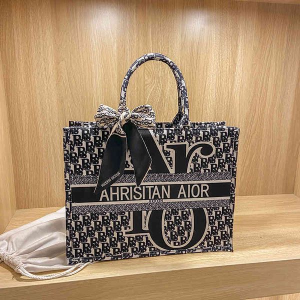 

2022 latest handbag factory store texture large capacity canvas ins one shoulder bag commuter portable women's