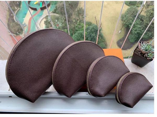 

new fashion women cosmetic bags organizer famous makeup bag travel pouch make up bag ladies cluch purses organizador toiletry bag 4pcs set