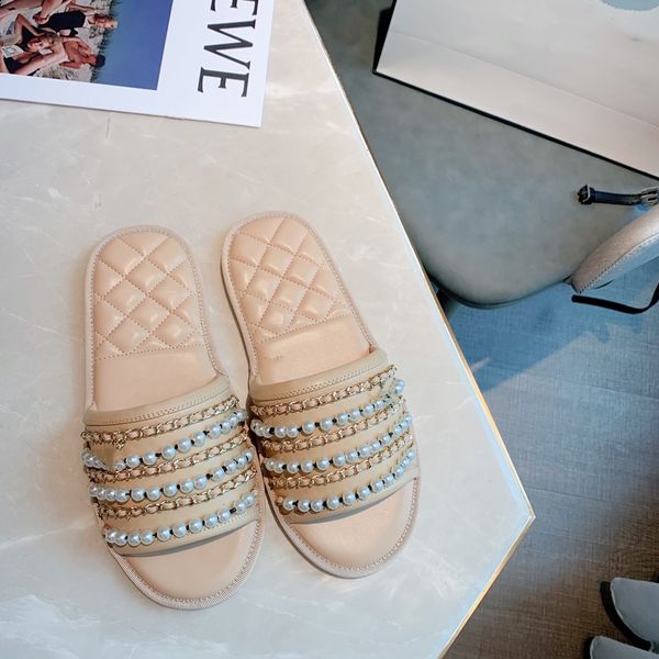 

in 2020, the new precious pearl slippers, hardware decorative sheepskin, electric lattice and rusty sheepskin are fashionable and luxurious, Black