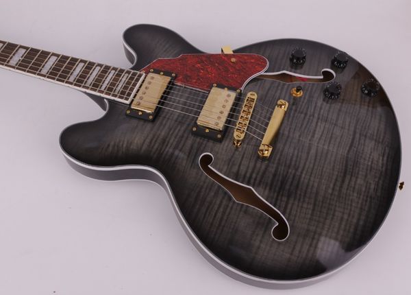 

hollow electric jazz guitar with flame maple veneer on top