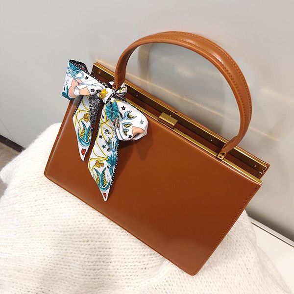 

simple retro metal clip bag female 2020 new fashion female bag shoulder portable envelope handbaag