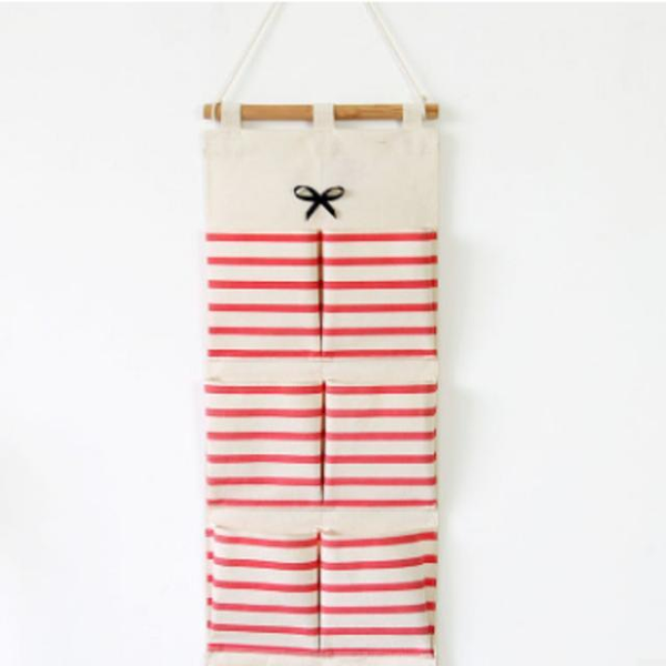 

cloth striped bow 6 pockets storage hanging bag wall storage hanging bag sundry wall1