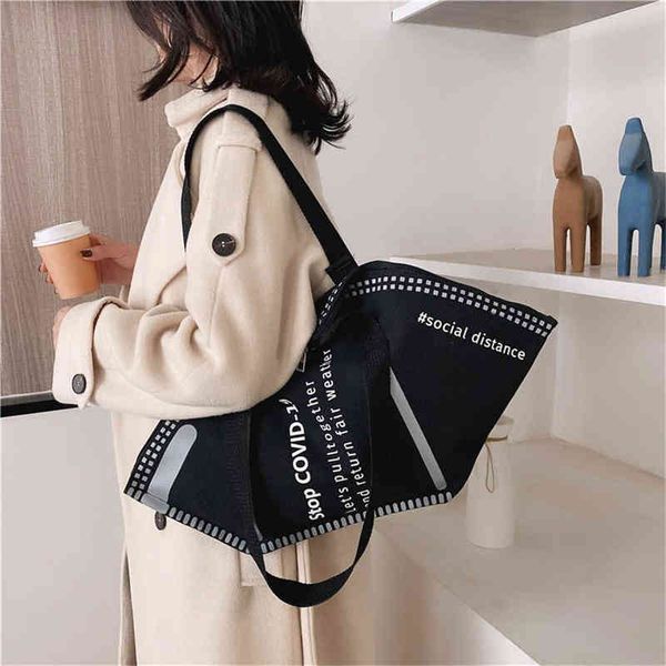 

nxy shopping bags women s mask shape canvas large capacity shoulder letter printing portable zipper dumpling tote 0209