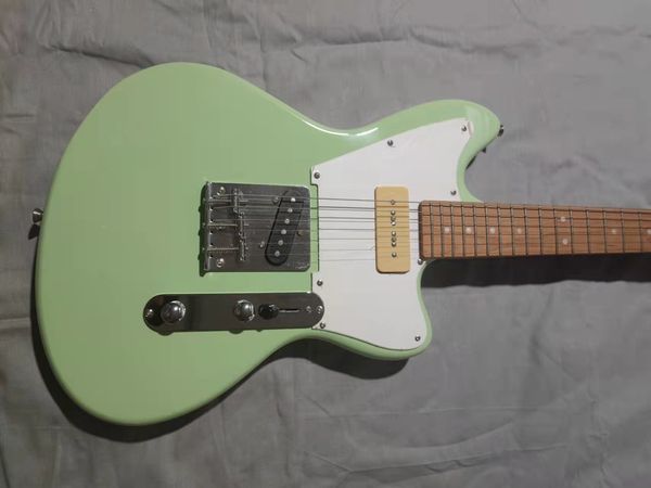 

light green six string electric guitar. we can customize any style of electric guitar and bass guitar