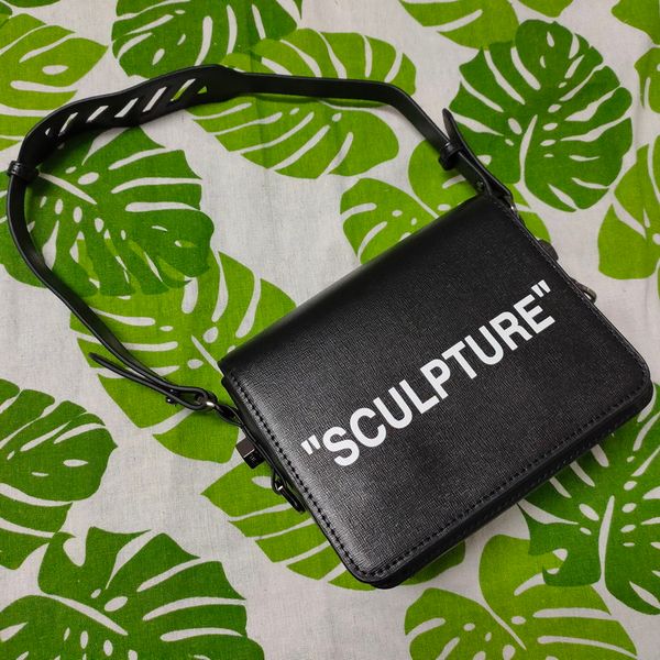 

new sculpture handbag shoulder bag clip bag authentic black and white handbags