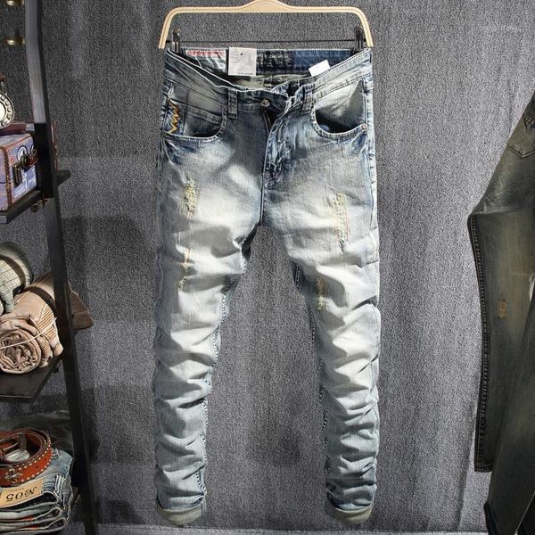 

newly designer fashion men jeans light blue slim fit ripped jeans men embroidery denim pants streetwear hip hop homme1