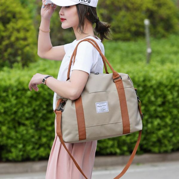 

wet and dry isolation canvas hand shoulder travel bag women's short trip luggage bag storage students large capacity
