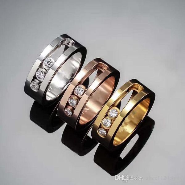 

fashion move cz diamond three stone ring stainless steel zircon crystal moving finger ring for women female couples famous brand jewelry, Golden;silver