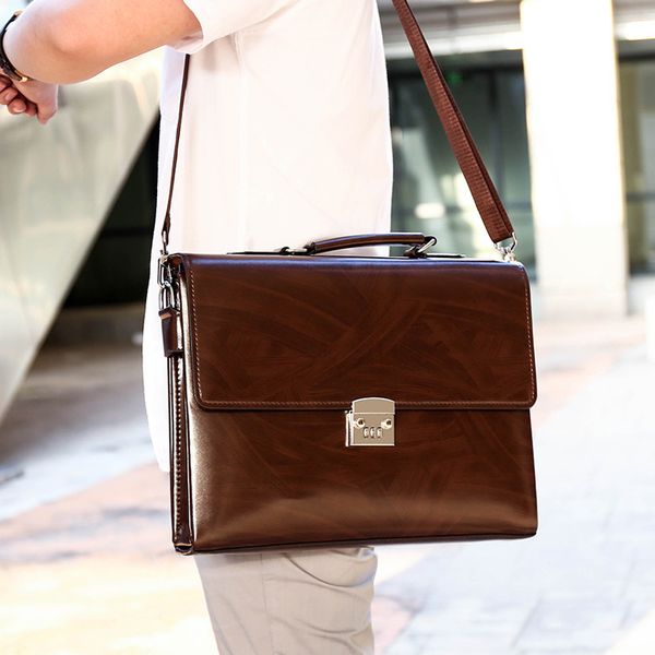 

2021 the new male leather purse plutonium material shoulder messenger satchel computer retro fashion password lock 3x2d