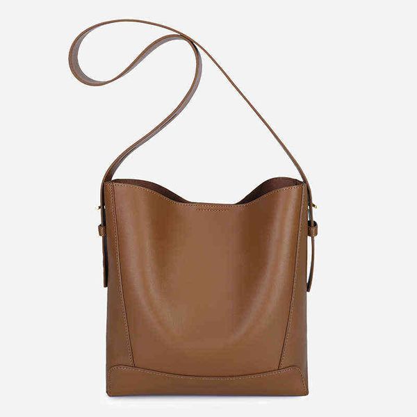 

nxy evening bags women's bag 2022 new large capacity bucket niche design simple and versatile one shoulder messenger bag leather 220211