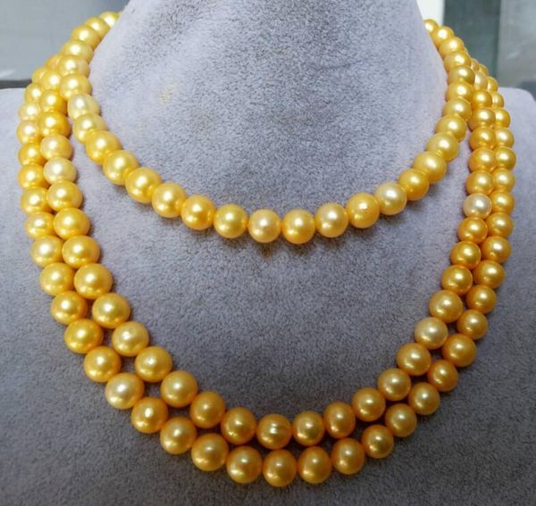 

beautiful 8-9 mm round natural pearl necklace 50" yellow clasp, Silver