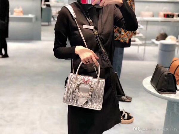 

new european classic luxury goods style ladies hand bag single shoulder bag chain decoration water drilpure color real sheepskin making soft
