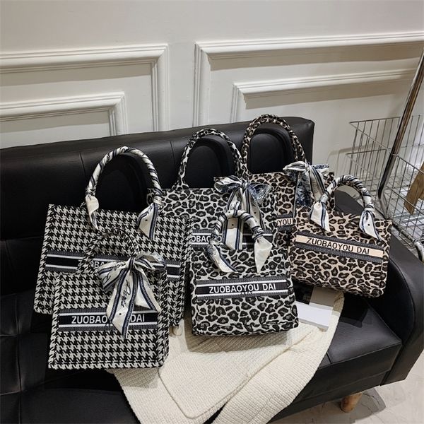 

outlet sale 80% off leopard canvas bag 2022 autumn and winter new texture tote bag korean version foreign style hand leisure armpit a520