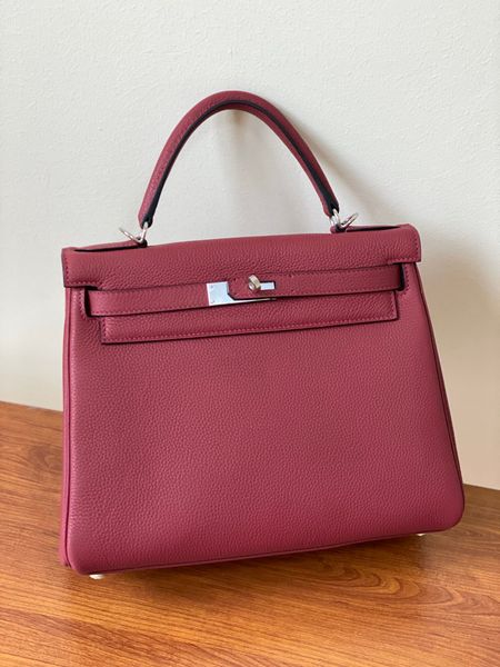 

whosale half handmade 25cm burgundy togo leather design purse, wax thread, have both gold and silver hardware,contact me for details