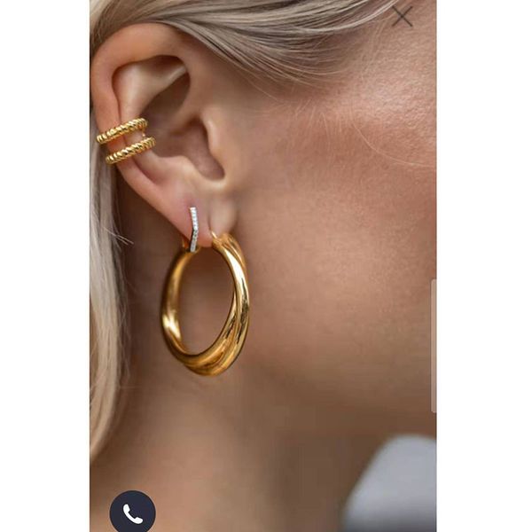 

luxurys design fashion round big ear roll golden old retro earrings
