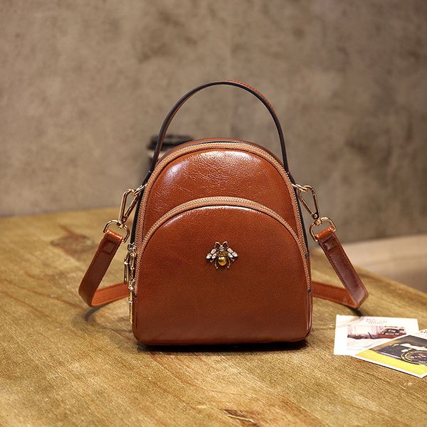 

высокое качество vintage кожа женщин рюкзак small shoulder bag bagpack mochila feminina болса bolsos mujer back pack ab14 201006