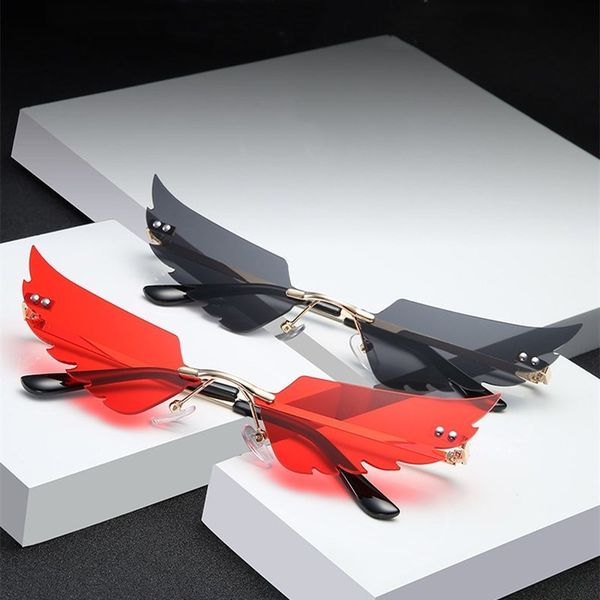 

fashion rimless wing sunglasses women vintage clear ocean lens eyewear men driver goggles pink yellow sun glasses shades uv400