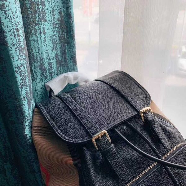 

b backpack with check pattern and litchi skin