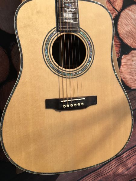 

2022 new 41" 6 string acoustic guitar. spruce veneer and rosewood back.