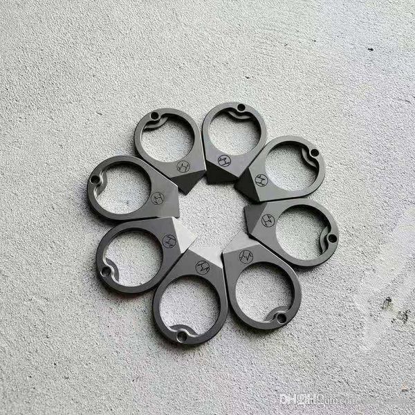 

titanium alloy edc creative key chain pendant multifunctional finger tiger bottle opener express knife with simple personality