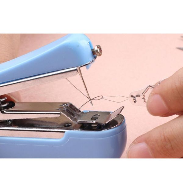 

popular lovely cordless hand-held clothes sewing machine ho qylogg garden2010