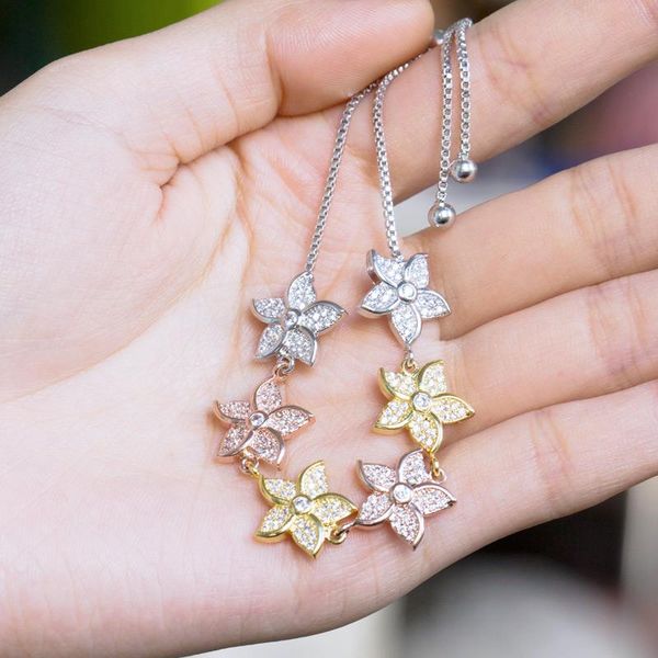 

huitan fashion tennis bracelet with three-tone plum blossom design tiny cz pave setting adjustable charm bracelets for women, Golden;silver