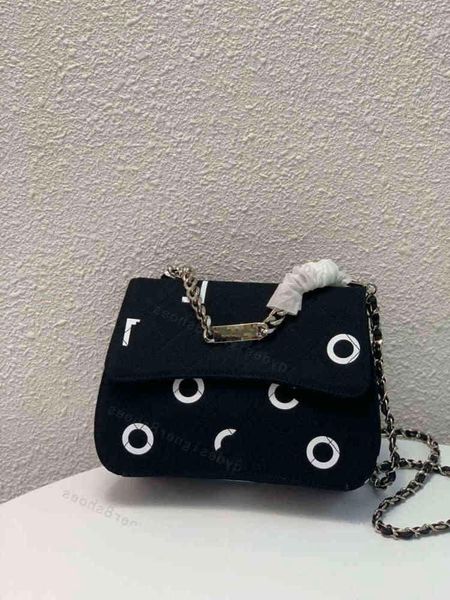 

woman black bag denim with big letters screen designer handbags tote