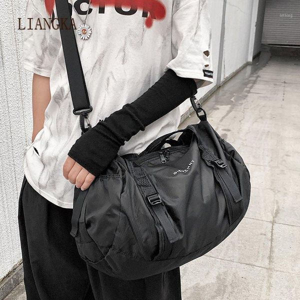 

2021 new waterproof folding travel bag oxford large capacity men's travel duffle black shoulder handbag round messenger bag1