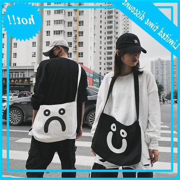 

2020 creative women's one shoulder korean version cute smiling face hand canvas bag