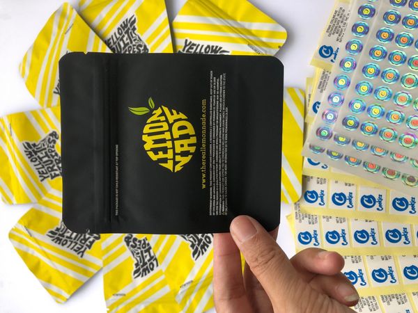 

empty 3.5g yellow black bags hologram label and fruit stickers bags local flavors mylar smell bags proof stripes bag bbynz bdetoys
