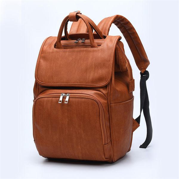 

pu leather baby diaper backpack for moms large capacity nappy bag with changing pad + stroller straps brown and black 1005