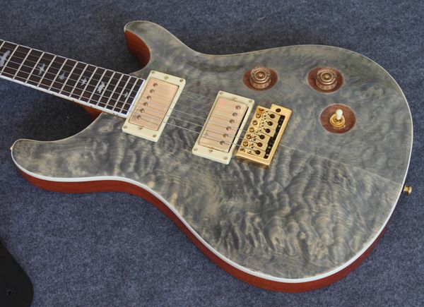

custom electric guitar reed smith quilted maple manual mahogany eagle headstock logo mop birds inlay tremolo bridge gold hardware
