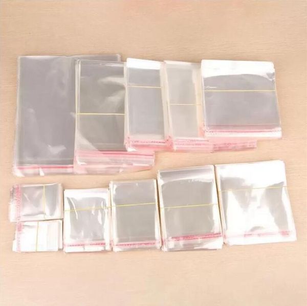 100 pcs lot celofane sacos transparentes auto adesivo sacos de vedação liso opp malotas de plástico para doces cookies roupas