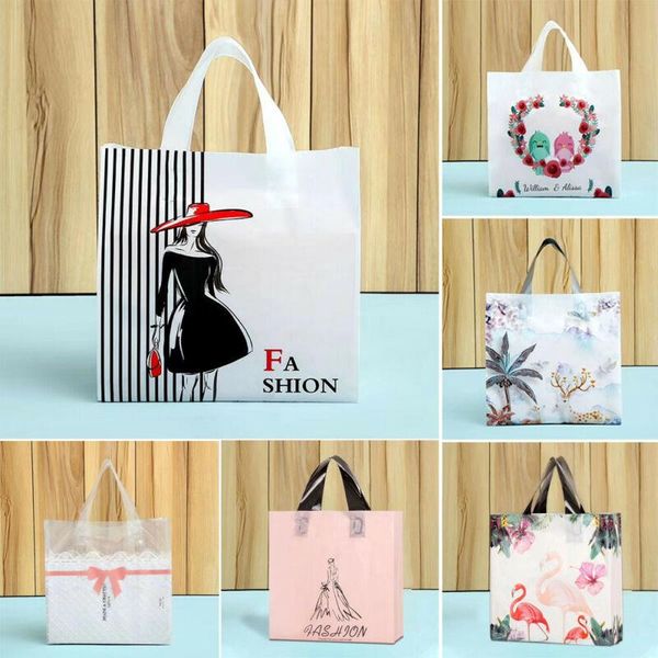 

gift wrap 50pcs stylish plastic shopping bags with handle boutique clothes packaging bag