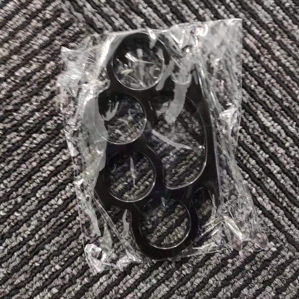 

fighting glass fiber finger tiger hand clasp boxing clasp black aluminum alloy four finger boxing sleeve aluminum tiger ring defensive weapo