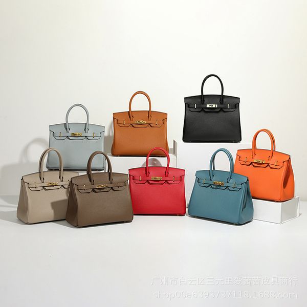 

h family leather togo calfskin litchi pattern lock women's large capacity hand messenger bag