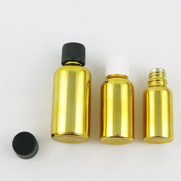 

200 x new design 5ml 10ml 20ml 30ml 50ml 100ml refillable gold glass bottle with childproof lids 1oz glass cosmetic container